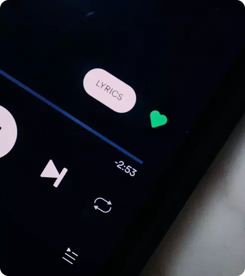 image of a phone showing a song being played