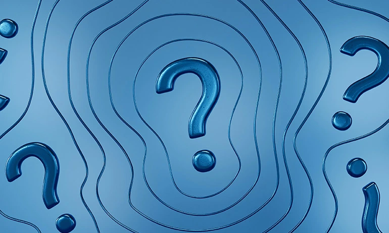 Multiple blue question marks on a wavy blue background.