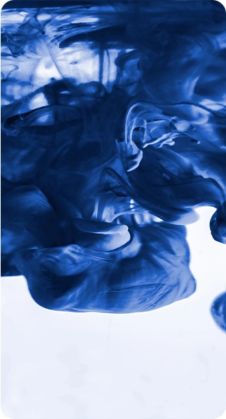 Blue ink swirling in water.