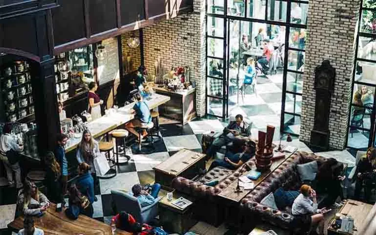 a restaurant with people dining in