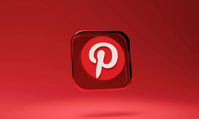 A 3D rendered icon of Pinterest with a white 'P' on a shiny red cubed background on a red surface.