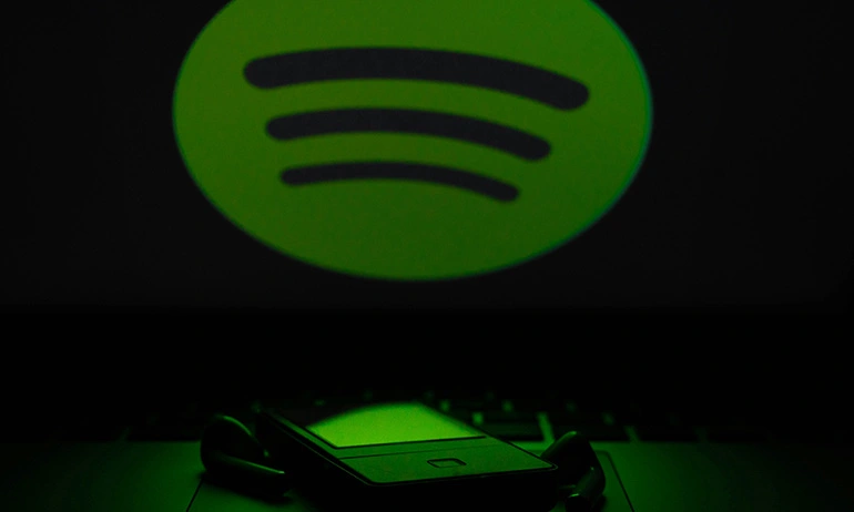 Spotify logo projected in a laptop.
